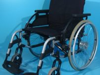 Scaun cu rotile second hand/latime sezut 52 cm.