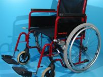 Scaun cu rotile second hand/latime sezut 54 cm.