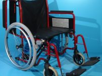 Scaun cu rotile second hand/latime sezut 54 cm.